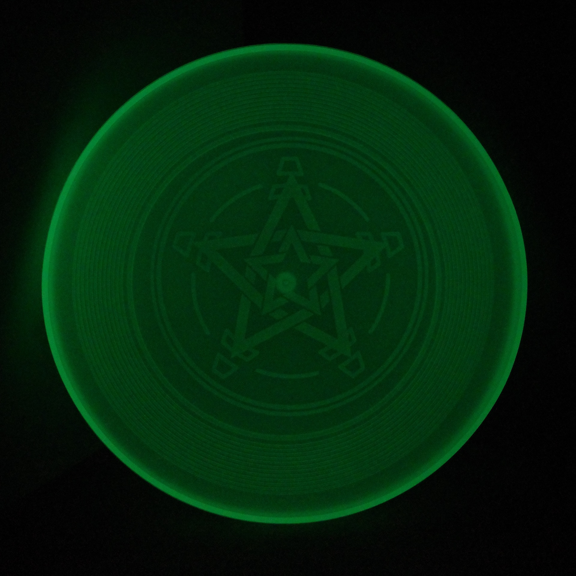 glowing green disk
